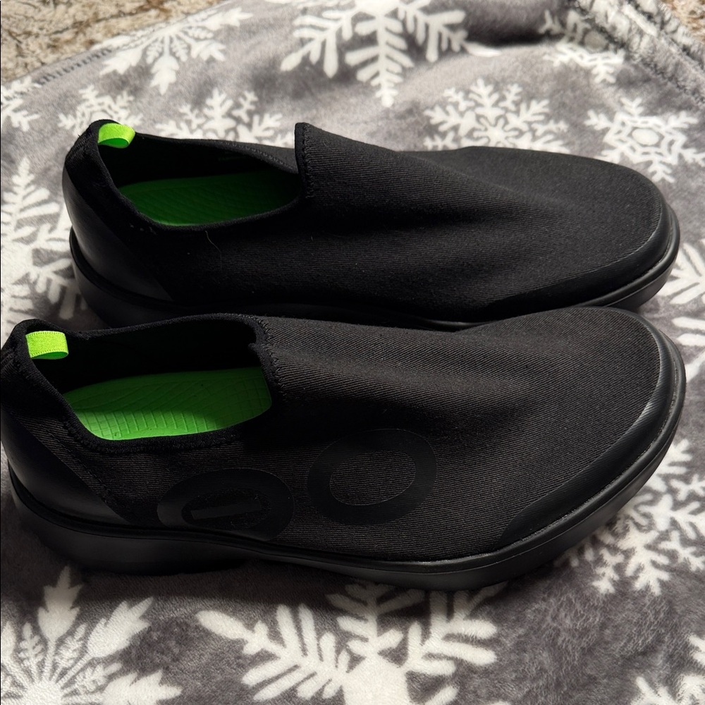 Black Slip-On Shoes with Green Accents